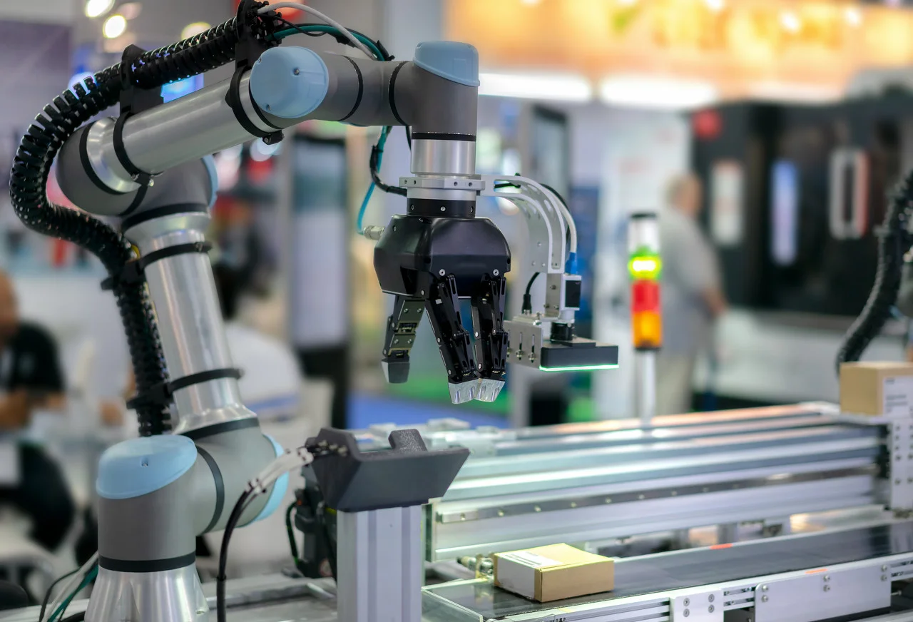 Industrial robot gripper in factory automation scene